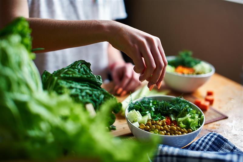 Women shifting through nutrients